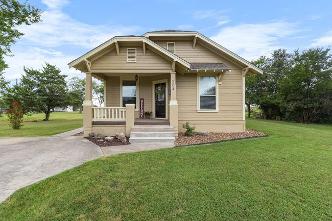 Bungalow style home featuring a covered front porch | Image 4