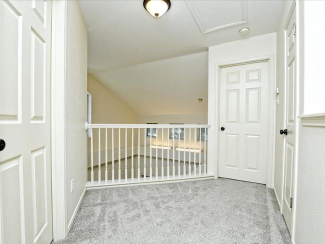 Bonus room with baseboards, lofted ceiling, and carpet | Image 11