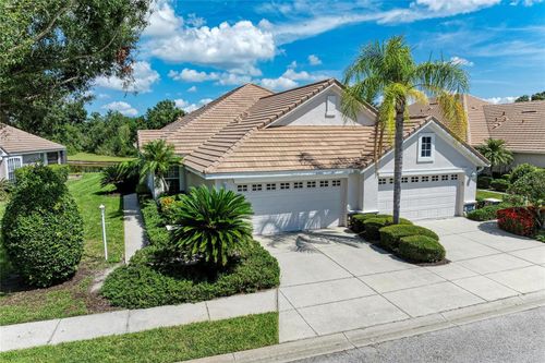 7039 Woodmore Ter, LAKEWOOD RANCH, FL, 34202-8958 | Card Image