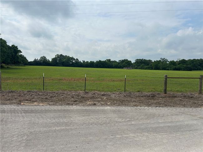 View of street with a rural view | Image 5