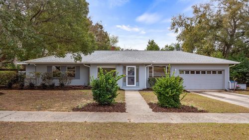 107 E Magnolia Ave, HOWEY IN THE HILLS, FL, 34737-3332 | Card Image