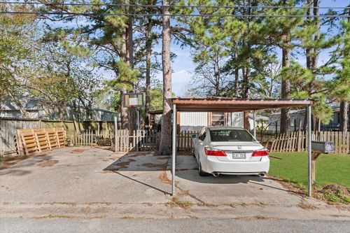 145 Rolling Hills Dr, Conroe, TX, 77304-1142 | Card Image