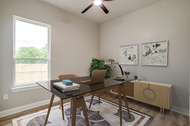 Office area featuring baseboards, a ceiling fan, and wood finished floors | Image 23