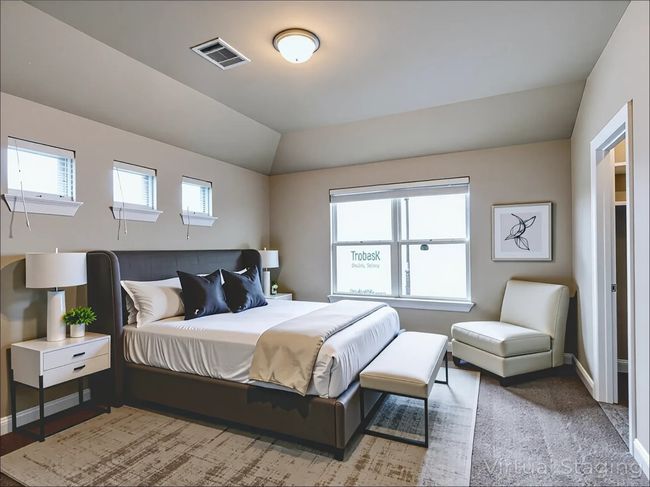Bedroom with baseboards and vaulted ceiling | Image 28
