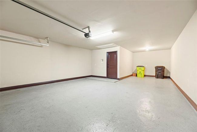 The attached 3 car, tandem garage is approximately 9 x 20 on the left and 9 x 32 on the right. | Image 24