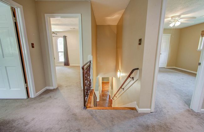 Hall between bedrooms and the gameroom. | Image 42