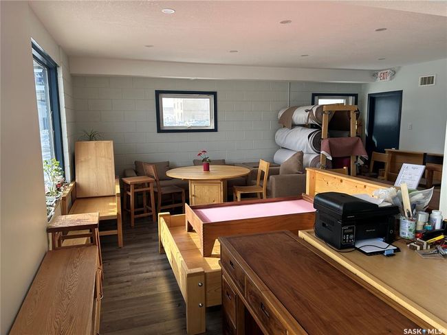 Playroom with dark wood-type flooring, plenty of natural light, visible vents, and recessed lighting | Image 10