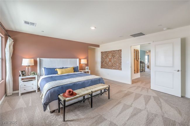 Bedroom featuring carpet and multiple windows. Photo is representational only; actual home finishes may vary. | Image 21