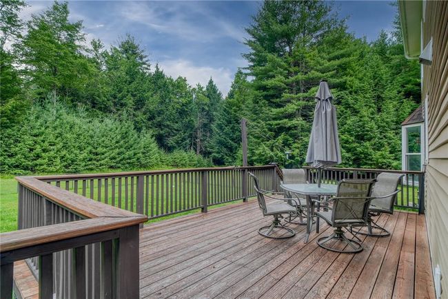 Deck featuring a yard | Image 30