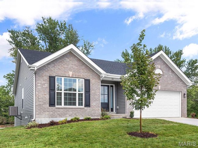 Ranch-style house with a garage, driveway, brick siding, and a front lawn | Image 4