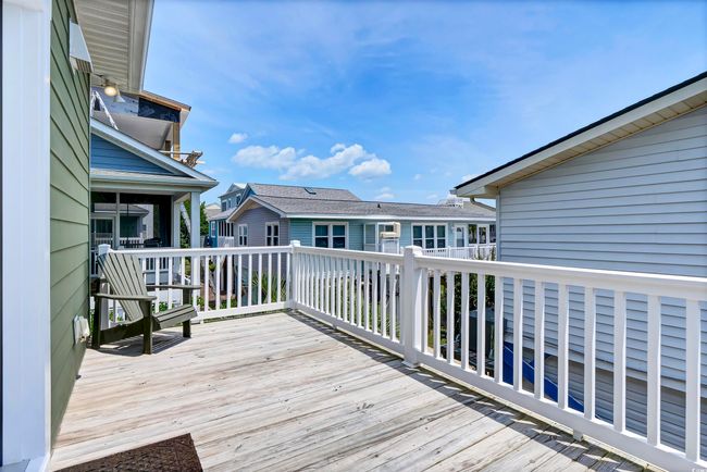 Wooden terrace with a residential view | Image 12