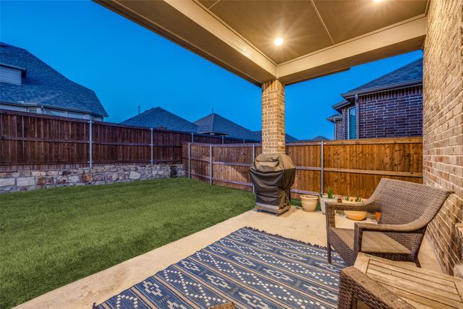 View of patio featuring a fenced backyard | Image 33