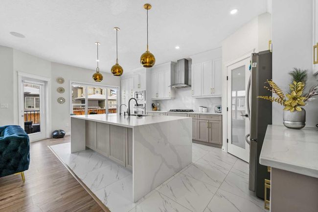 316 Kinniburgh Link, House other with 5 bedrooms, 4 bathrooms and 6 parking in Chestermere AB | Image 12
