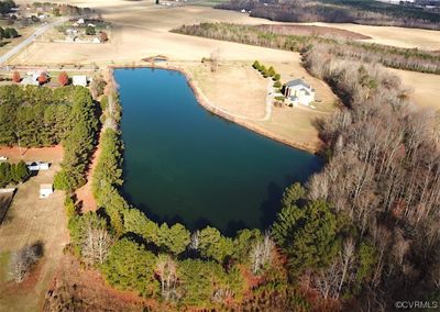 Birds eye view of property with a water view | Image 1