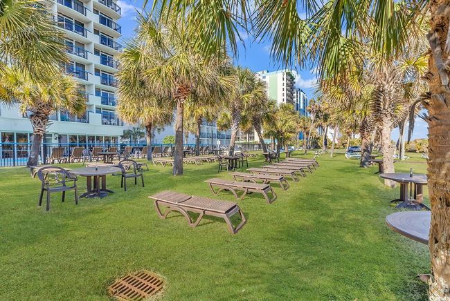 Surrounding community featuring a lawn | Image 25