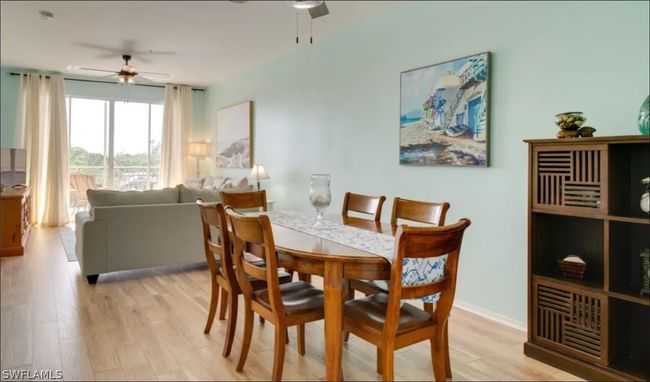 Dining area with room for table extensions. | Image 13