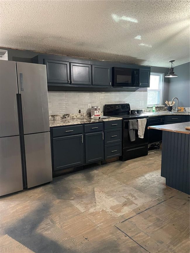 1590 Candleberry St, House other with 3 bedrooms, 2 bathrooms and null parking in BUNNELL FL | Image 4