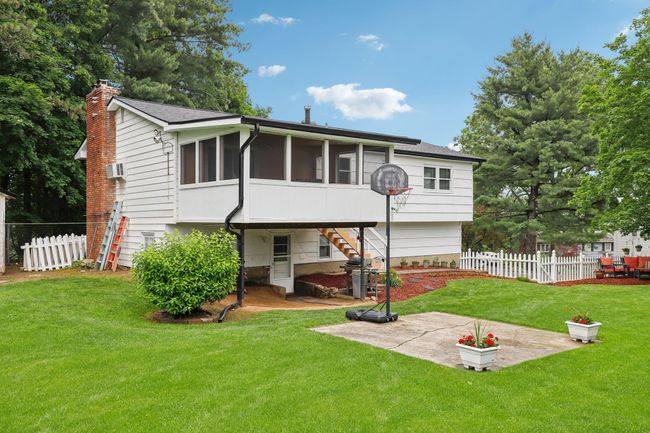 View of fenced backyard | Image 32
