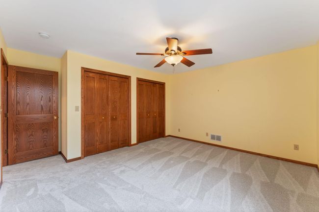 9946 Wellington Ln, Townhouse with 4 bedrooms, 3 bathrooms and null parking in Woodbury MN | Image 38