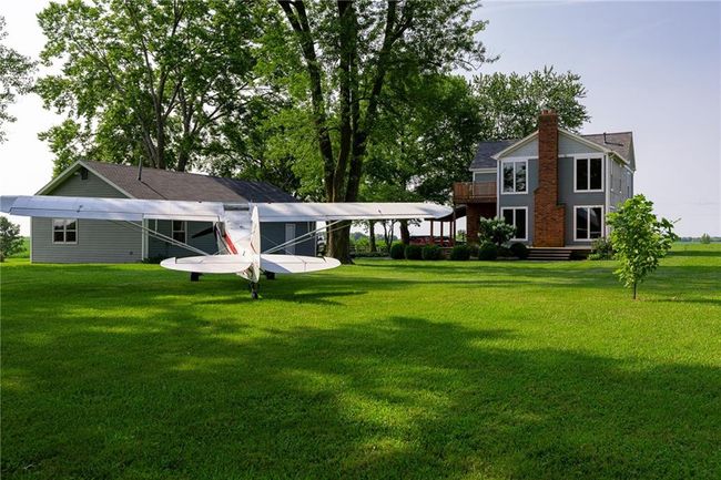 View of yard featuring a carport | Image 5