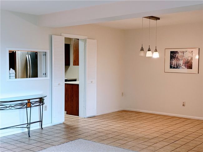 Dining room with pass thru to kitchen | Image 8