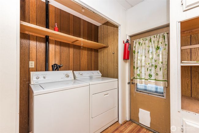 inside laundry with washer and dryer included | Image 14