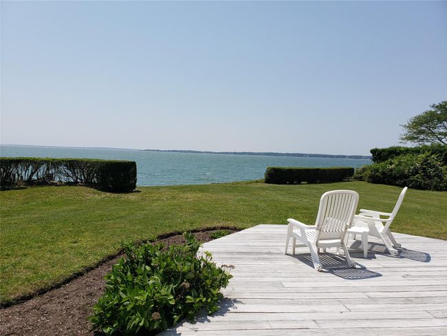 Deck all along the water side from parking to primary suite bedroom doors | Image 7