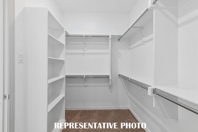 A dream owner's closet in a dreamy owner's suite! REPRESENTATIVE PHOTO | Image 13