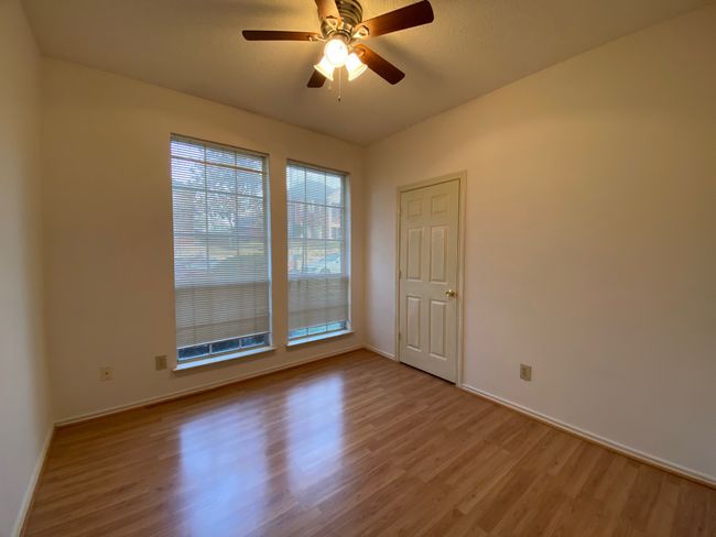Unfurnished room with wood finished floors and ceiling fan | Image 12
