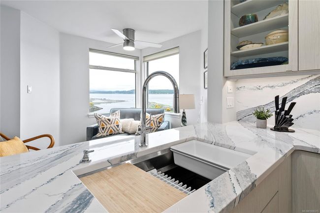 Workstation sink. A built-ledge that allows for sliding accessories. Cutting boards, colanders, and drying racks. | Image 5