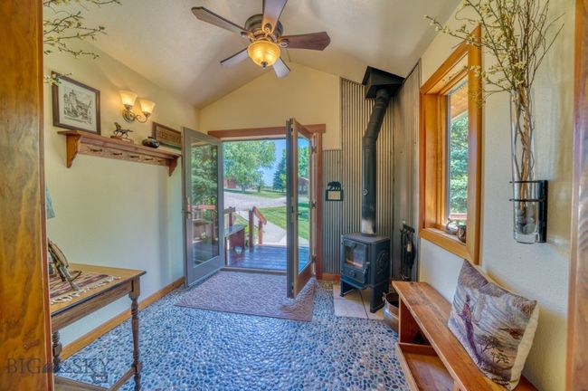 Entry way with wood burning stove | Image 31