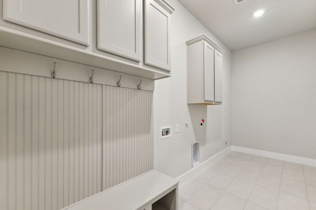 Mudroom with light tile patterned flooring and recessed lighting | Image 20