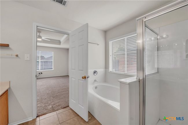 Separate shower and spacious garden tub | Image 17