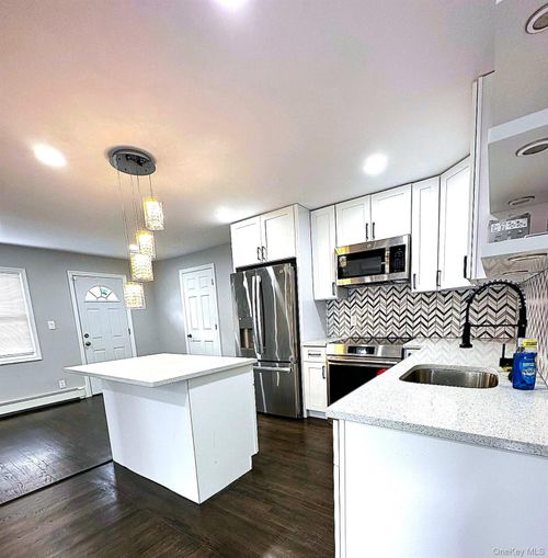 1093 Ditmas Ave, Uniondale, NY, 11553-3232 | Card Image