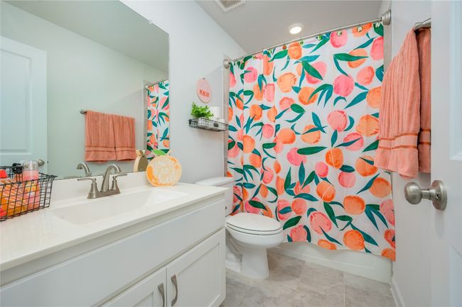 Bathroom with vanity and tile patterned floors | Image 17