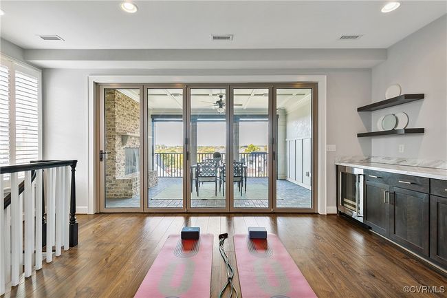 Workout area with beverage cooler, visible vents, and a healthy amount of sunlight | Image 34
