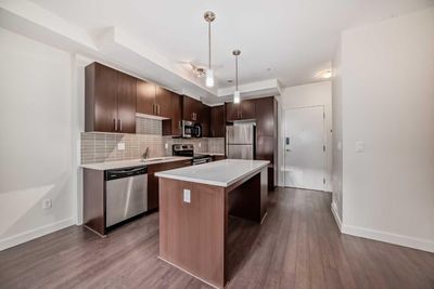 112 - 15233 1 St Se, Condo with 1 bedrooms, 1 bathrooms and 1 parking in Calgary AB | Image 1