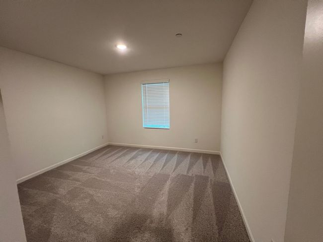 Empty room featuring baseboards, carpet flooring, and recessed lighting | Image 23