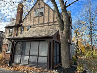 Back of house with a sunroom | Image 3