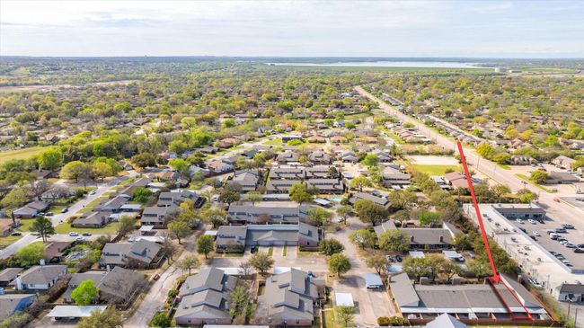View of Timber Ridge from 1103 Glenbrook designated with red arrow. 2nd unit from the right. | Image 27