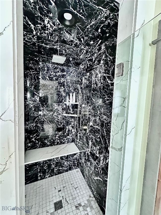 Marble tiled flooring and custom shower | Image 16