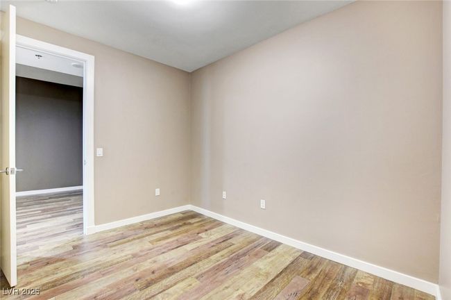 Second bedroom featuring baseboards and light wood finished floors | Image 27