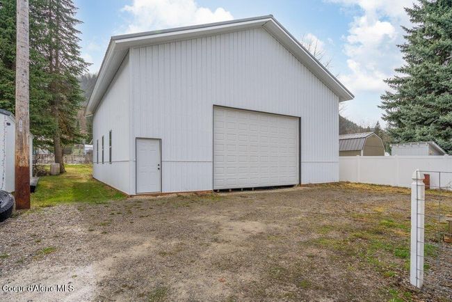 This.. much more exciting. 47'x40' shop for holding, well... almost anything. Garage door is 12' tall x 18' wide. | Image 7