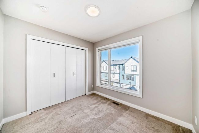 207 Evanscrest Square Nw, Townhouse with 2 bedrooms, 3 bathrooms and 1 parking in Calgary AB | Image 23