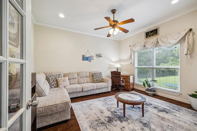 Bright and sunny office with french doors is just to the right of the entryway. This is the first of three office spaces. Fresh interior paint 2023 | Image 6