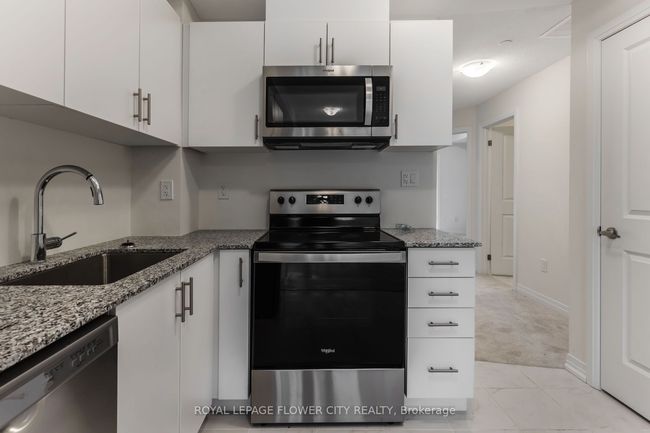 2 - 155 Tapscott Rd, Condo with 2 bedrooms, 1 bathrooms and null parking in Toronto ON | Image 21