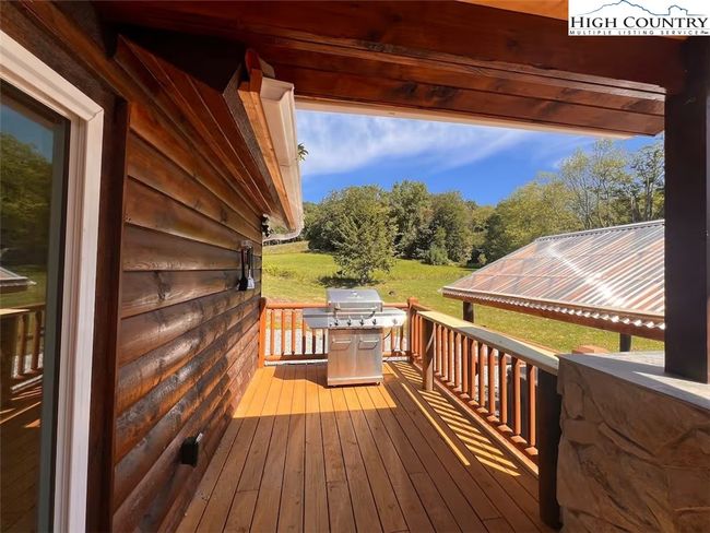 Covered Front porch & grilling area | Image 26