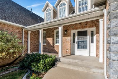 Doorway to property with covered porch | Image 2