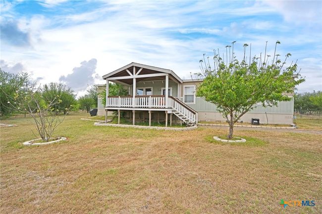 488 Union Wine Rd, Home with 4 bedrooms, 2 bathrooms and null parking in New Braunfels TX | Image 6