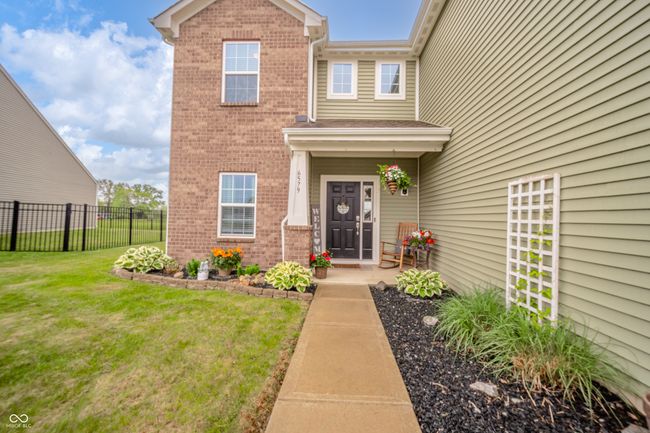 entrance to property featuring brick siding | Image 5
